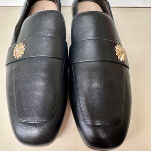 Stuart Weitzman Black Leather Loafers with Gold Detail